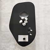 Rock Couchtisch oval schwarz 100 x 60 cm Melaminbeschichteter Holzverbund