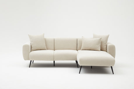 Ecksofa aus cremefarbenem Stoff – hohe, schlanke Beine – solide Innenausstattung – 252 x 155 cm – seitlich