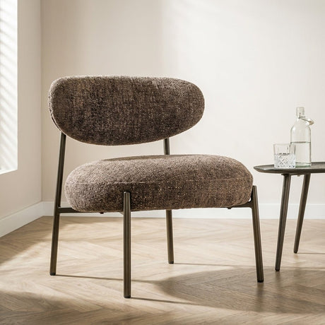 Fauteuil Nova Rond Bruin Stof sfeerfoto in modern interieur