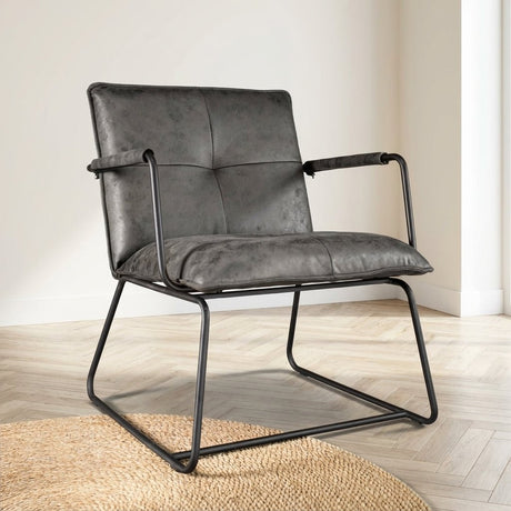 Industriële fauteuil Hailey antraciet eco-leer sfeerfoto in modern interieur