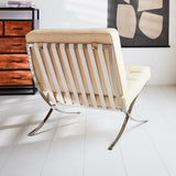 Sessel-Expo Dimehouse Creme LxBxH 80x78x78 Rindsleder Stimmungsvolles Foto diagonale Rückansicht