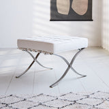 Fußhocker Expo Premium Dimehouse Weiß LxBxH 63x62x36 Leder Stimmungsvolles Foto diagonal von vorne