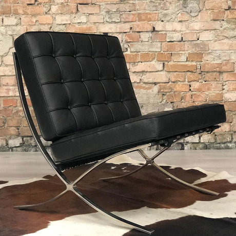 Sessel-Expo Dimehouse Schwarz LxBxH 80x78x78 Rindsleder Stimmungsvolles Foto schräge Rückansicht
